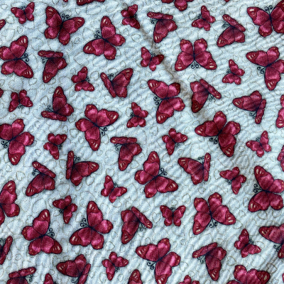 Tissu papillons rouges sur fond cru - Santoro of London