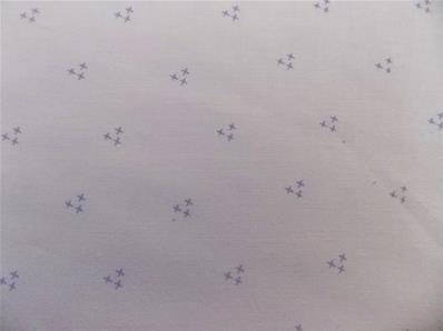 Grey crosstich on pale pink fabric