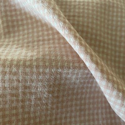 Tissu seersucker à carreaux rose